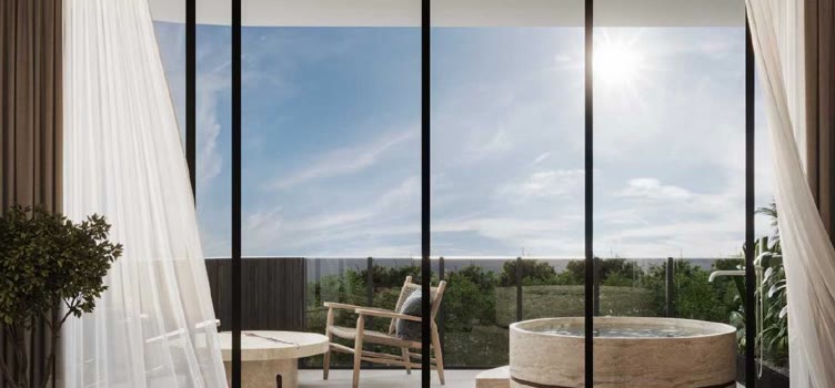 Premium residence terrace with a travertine jacuzzi and ocean view